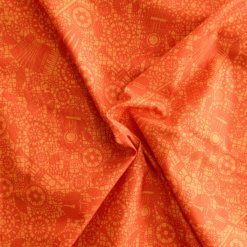 Mariachi Orange Cotton Fabric. Two tone orange with musical instruments. A bright lively design, great for dressmaking and craft projects.
