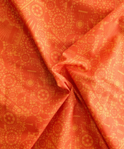 Mariachi Orange Cotton Fabric. Two tone orange with musical instruments. A bright lively design, great for dressmaking and craft projects.