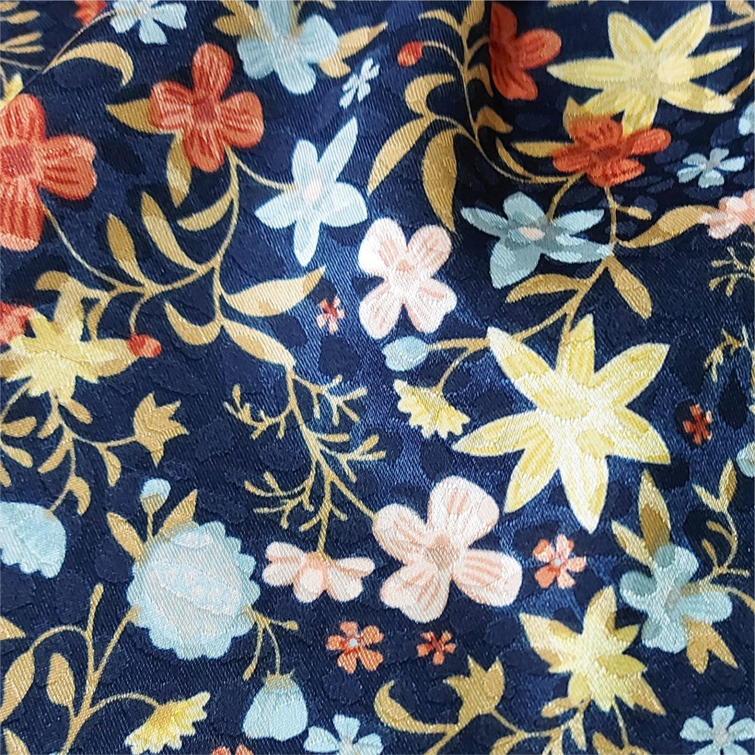 Satin Jacquard Flowers on Blue Dressmaking Fabric at More Sewing
