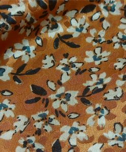 Stain Jacquard Flowers on Rust Dressmaking Fabric at More Sewing