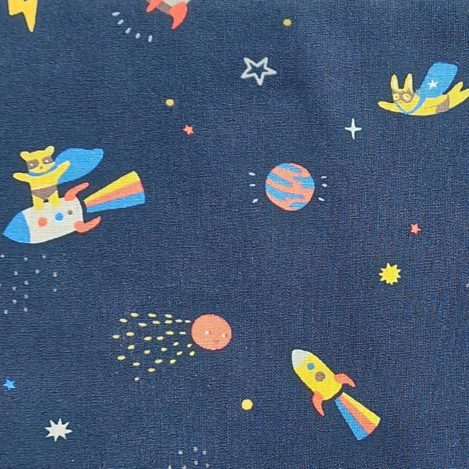 navy cotton poplin fabric space pattern at More Sewing