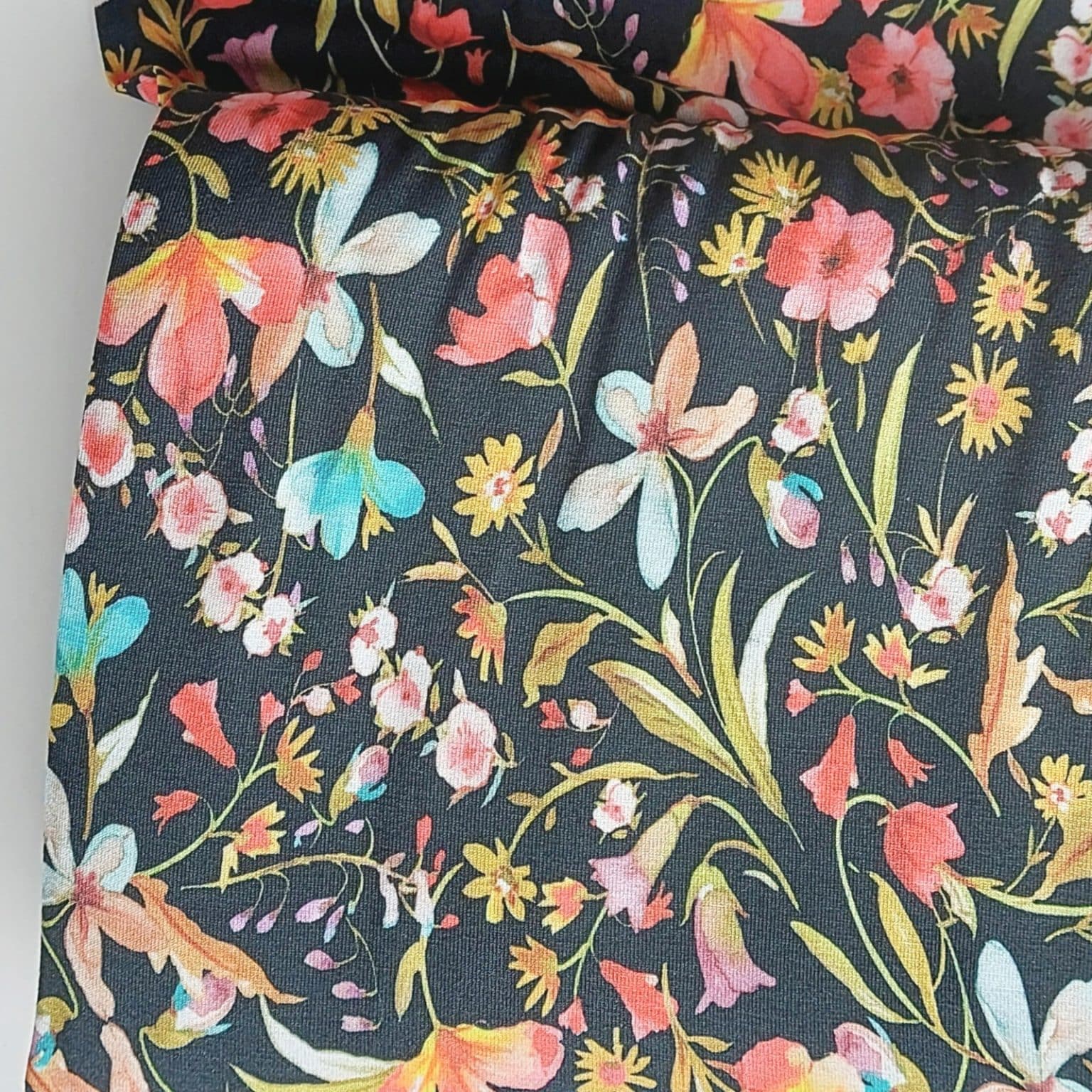 bright floral on black digital pring viscose jersey fabric | More Sewing