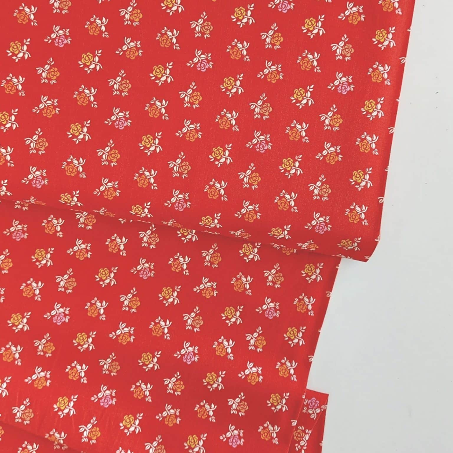 Intrigue Floral On Red Cotton Fabric | More Sewing