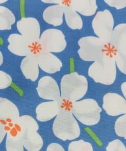 Whtie florwer on blue cotton fabric at More Sewing