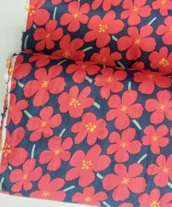 Red flower on blue cotton fabric | More Sewing
