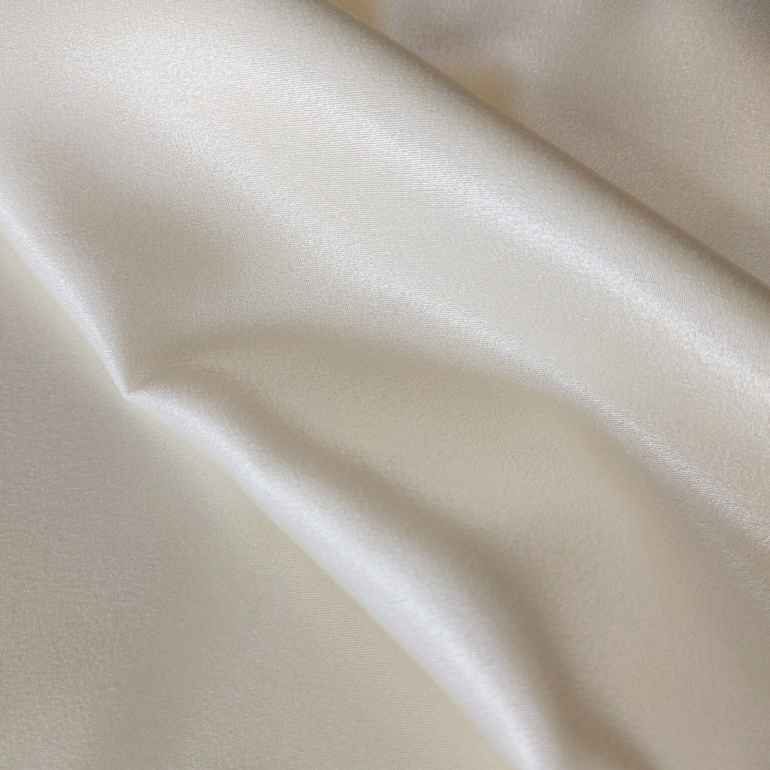 Cream polyester satin fabric | More Sewing