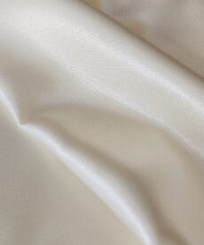 Cream polyester satin fabric | More Sewing