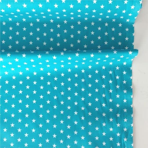stars on turquoise cotton fabric | More Sewing