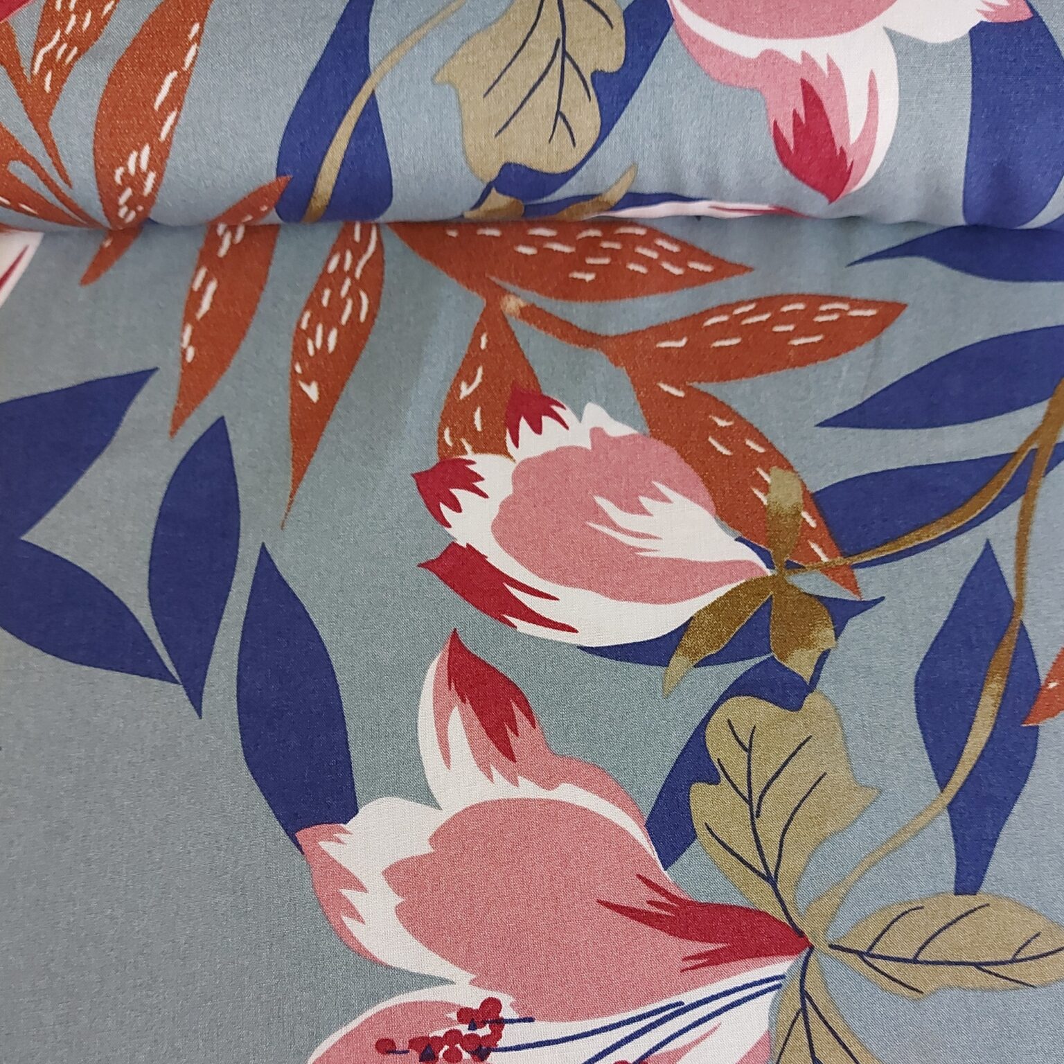bold floral on sage green viscose fabric | More Sewing