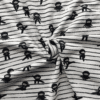 Cotton Jersey Fabric - Ninja on White - 150cm Wide