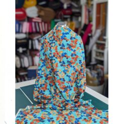 Cotton Rayon Mix Fabric - Leaves On Turquoise - 145cm Wide | More Sewing