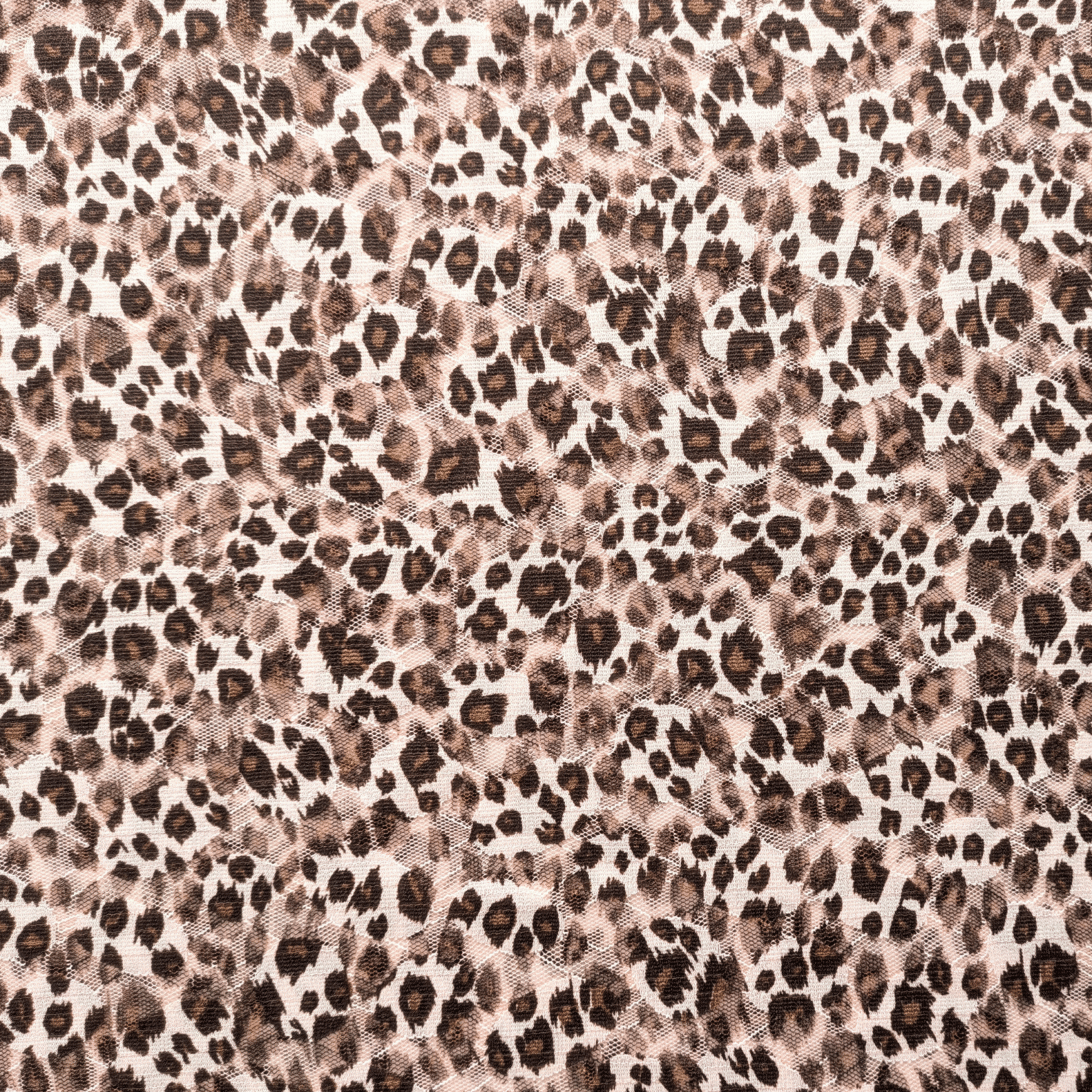 Polyester Fabric Stretch Mesh Leopard Spot. On trend, lightweight mesh fabric with a leopard spot pattern. 