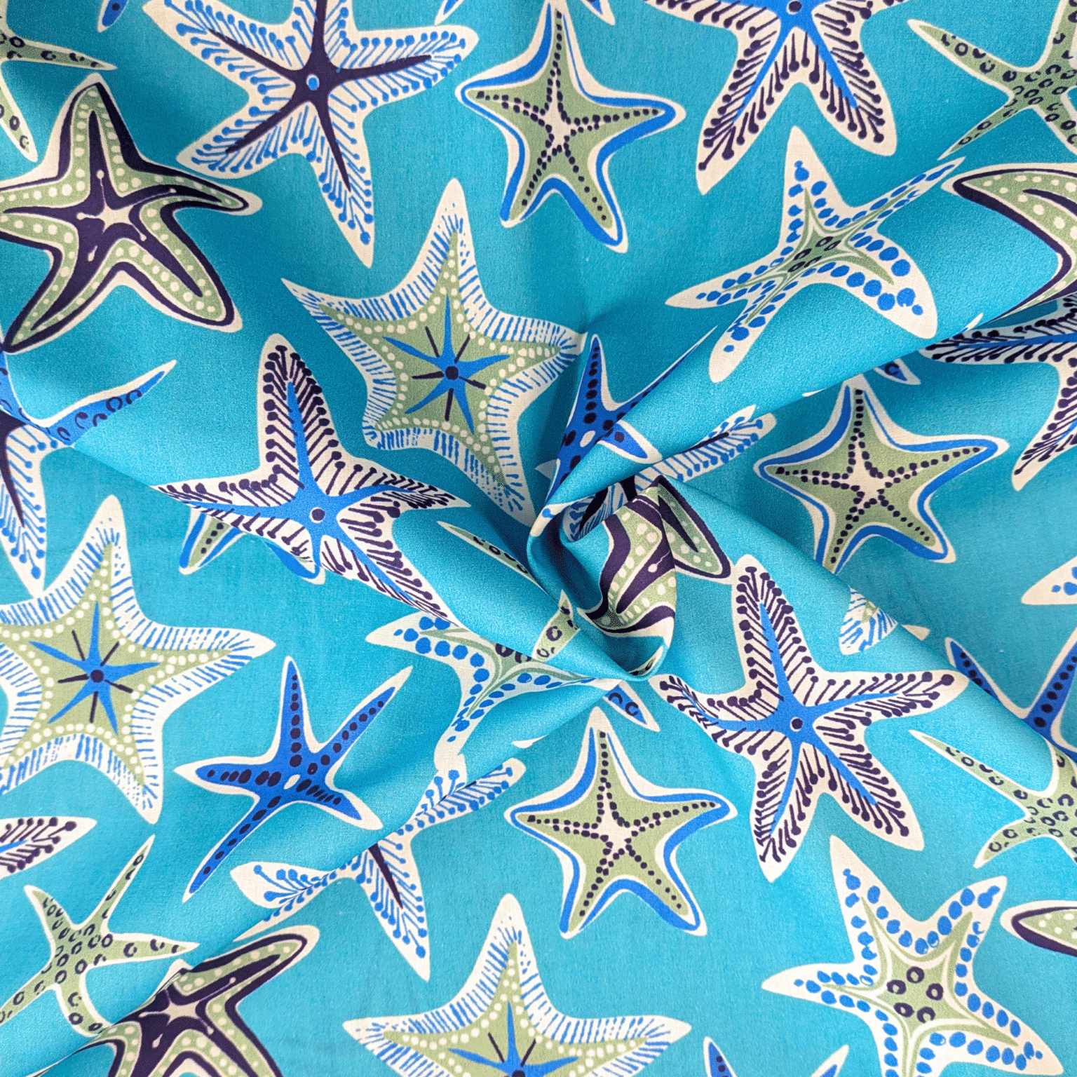 Cotton Fabric Starfish On Turquoise Blue at More Sewing