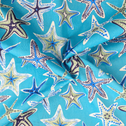 Cotton Fabric Starfish On Turquoise Blue at More Sewing