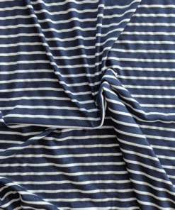 Viscose Blend Fabric Woven Stripe Jersey Fabric In Navy And White. 4 Way Stretch Woven Stripe Fabric.  Navy stripe approx 8mm wide. White stripe approx 4mm wide. Very soft, lightweight drapey jersey.