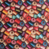 Digital Print 3D Reels Cotton Fabric. Soft cotton fabric with a colourful 3D thread spool/reel pattern. Perfect for dressmaking and craft projects.