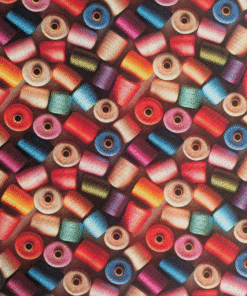 Digital Print 3D Reels Cotton Fabric. Soft cotton fabric with a colourful 3D thread spool/reel pattern. Perfect for dressmaking and craft projects.